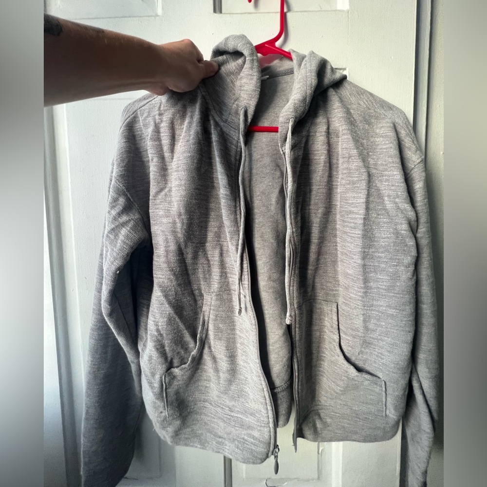 gray zip up jacket